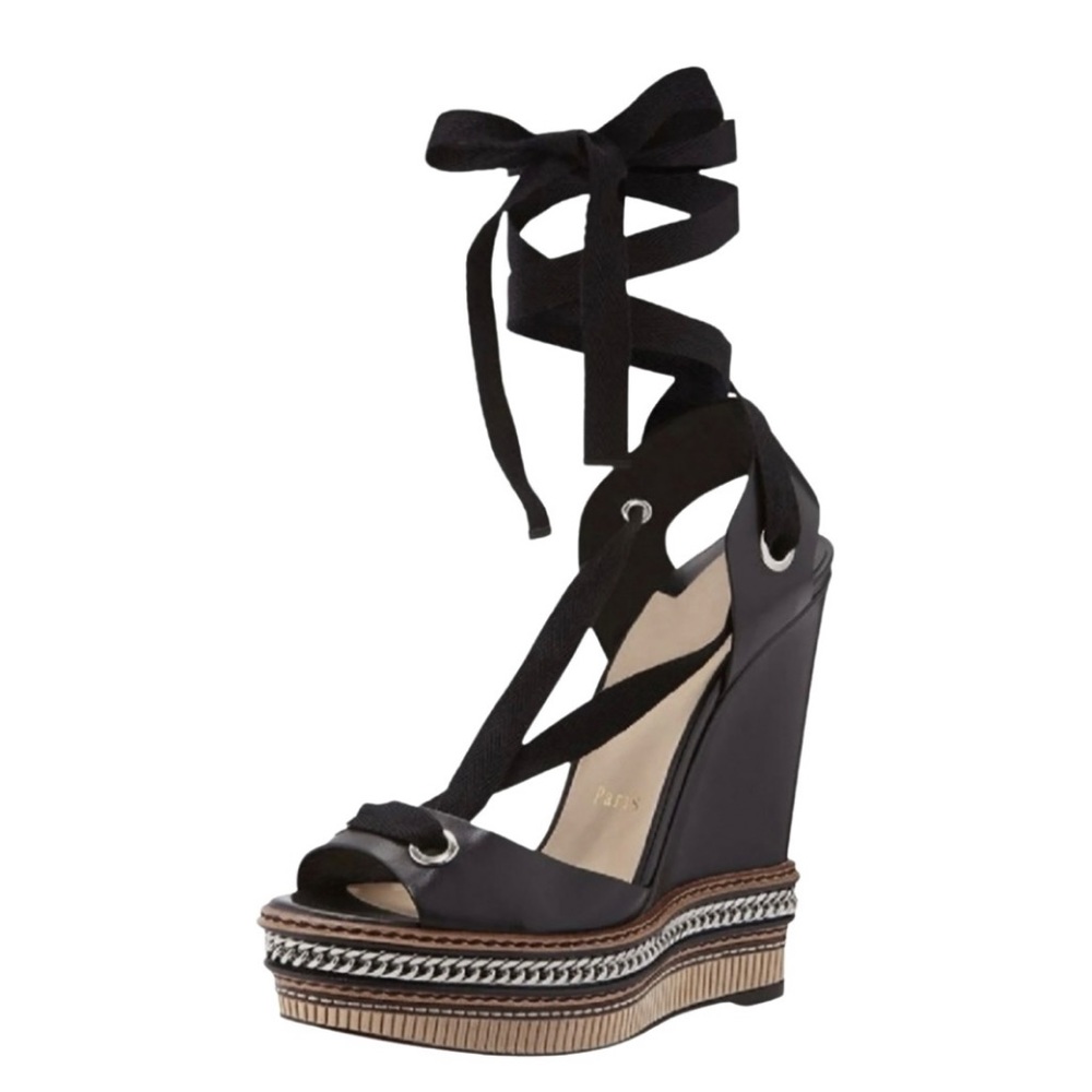 Christian Louboutin Tribuli Wedge Sandals.
Heel height: 14 cm.